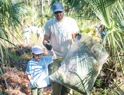 Two volunteers participating in the EEL Program.