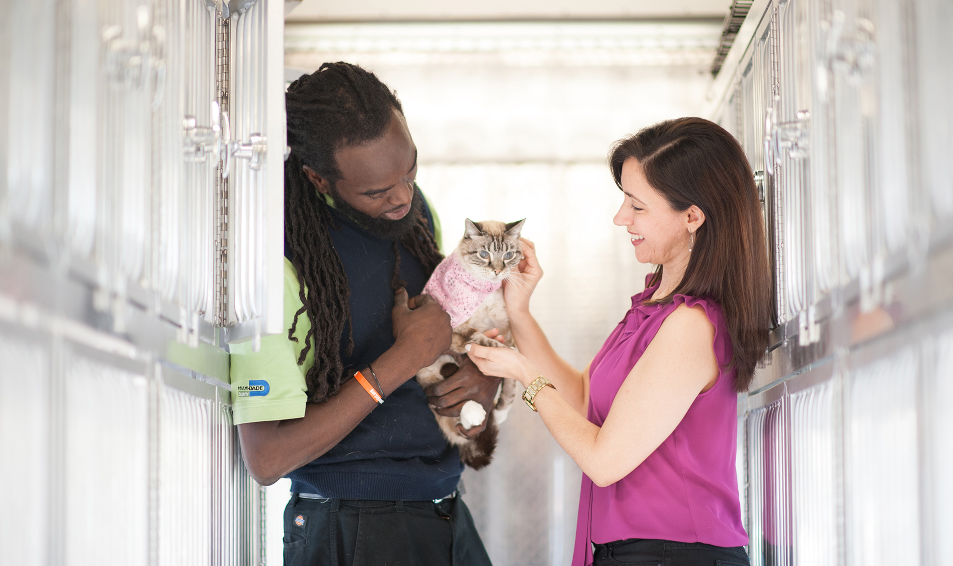 Two people at the animal shelter.