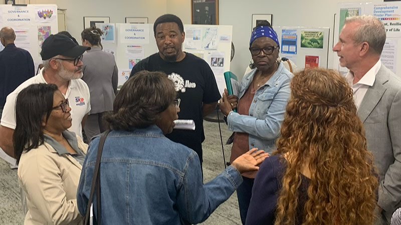 A group of residents having a discussion during an Evaluation and Appraisal Report workshop.