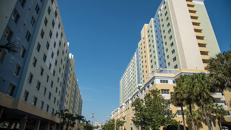 Photo of two multi-story buildings.