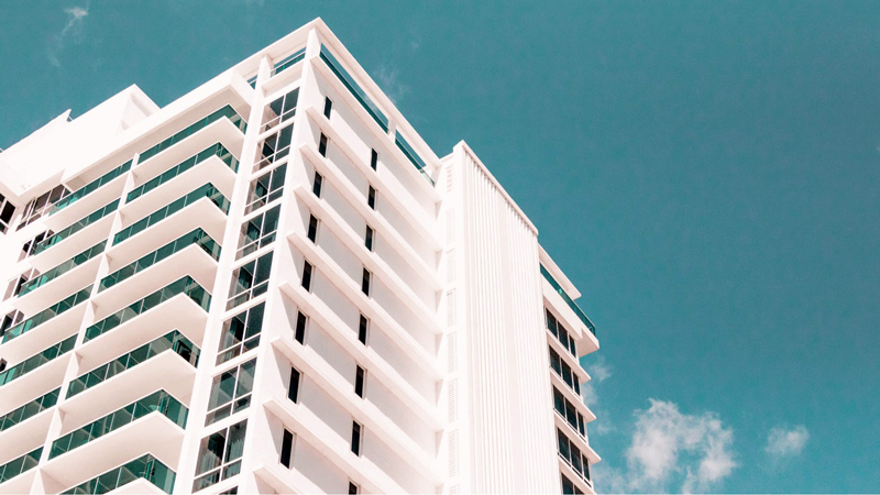 low-angle photograph of white building