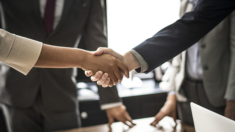 Two people shaking hands