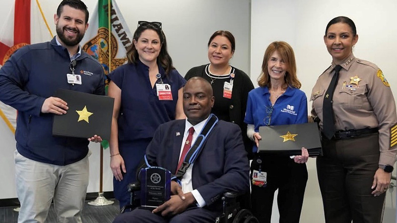 Injured deputy in wheelchair receives award